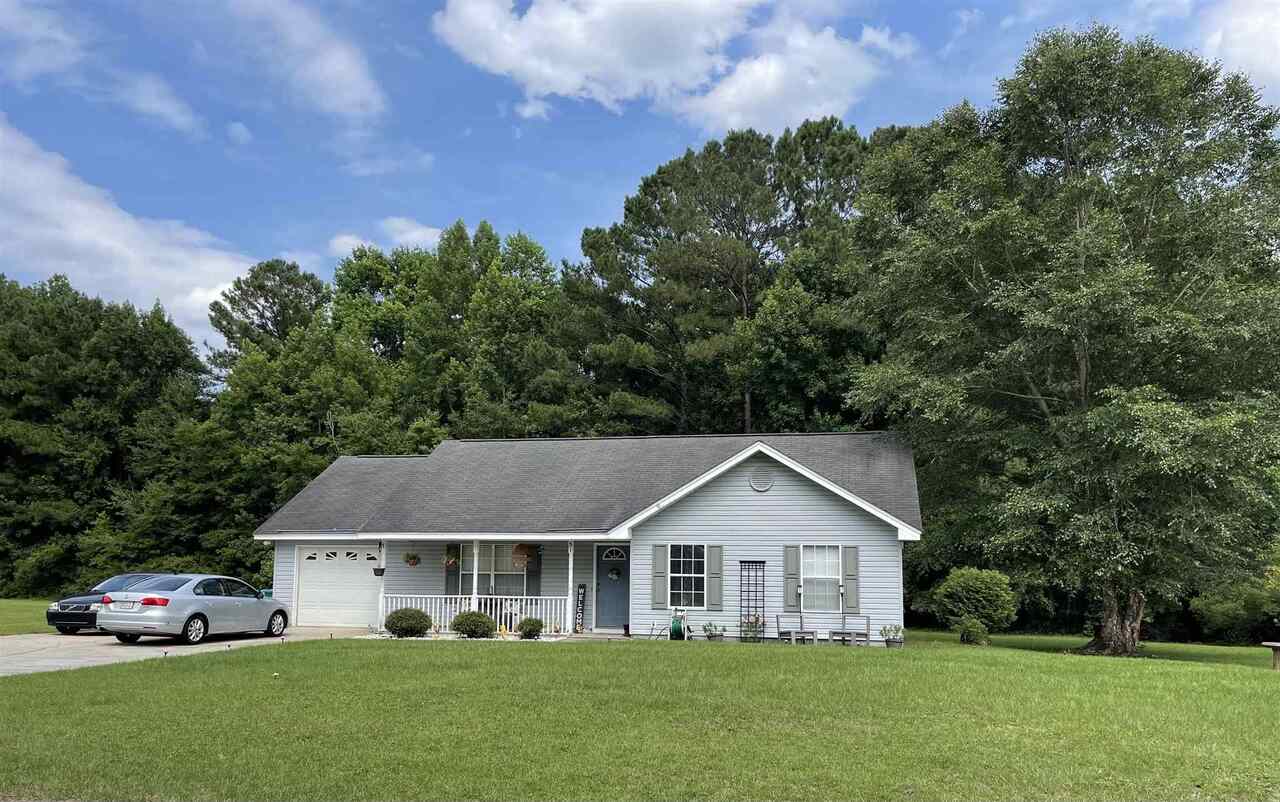 51 Del - A - Rae Circle Guyton, GA 31312 - Photo 1 of 1 a front view of a house with garden
