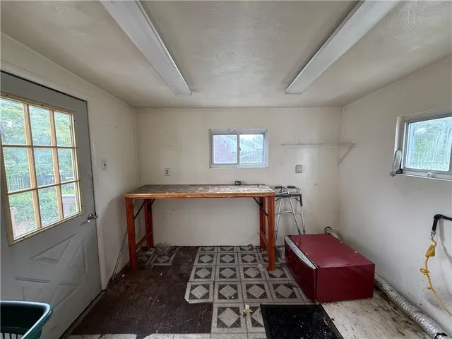 a room with a couch and a window