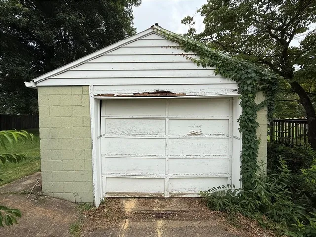 a view of a small white house