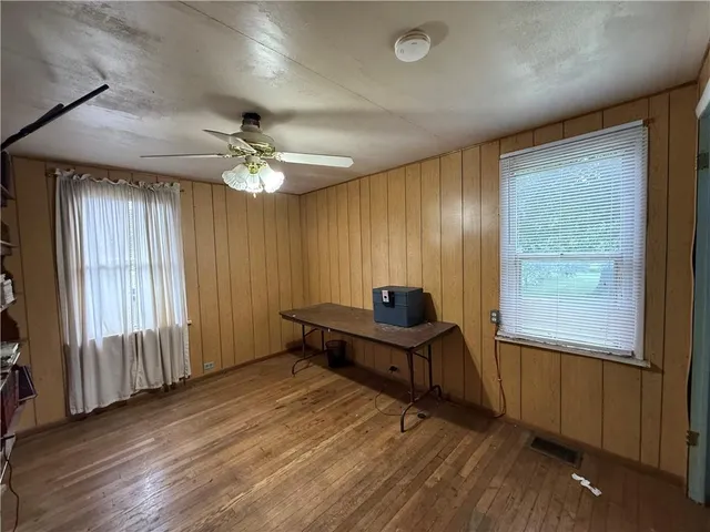 wooden floor and windows in an empty room