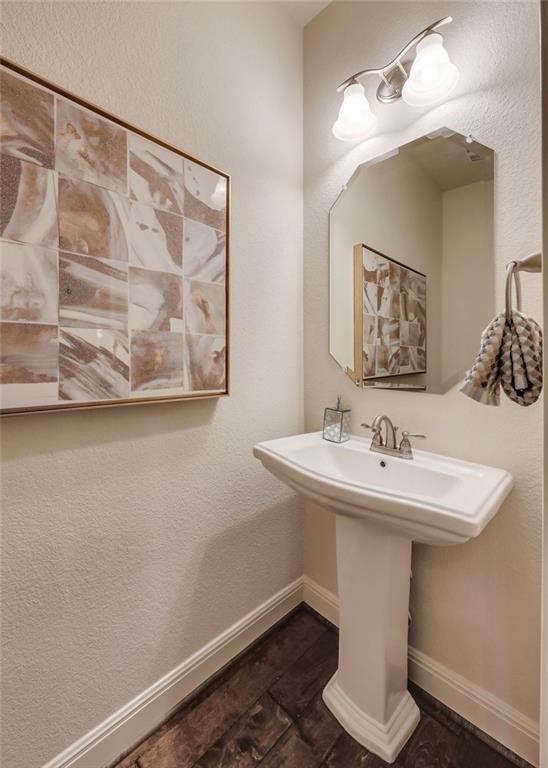 10825 Ballard Path Austin, TX 78717 - Photo 19 of 39 a bathroom with a sink and a mirror