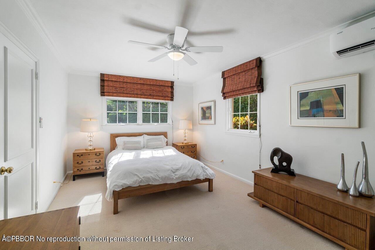 257 Fairview Road Palm Beach, FL 33480 - Photo 11 of 20 a bedroom with a bed and a window