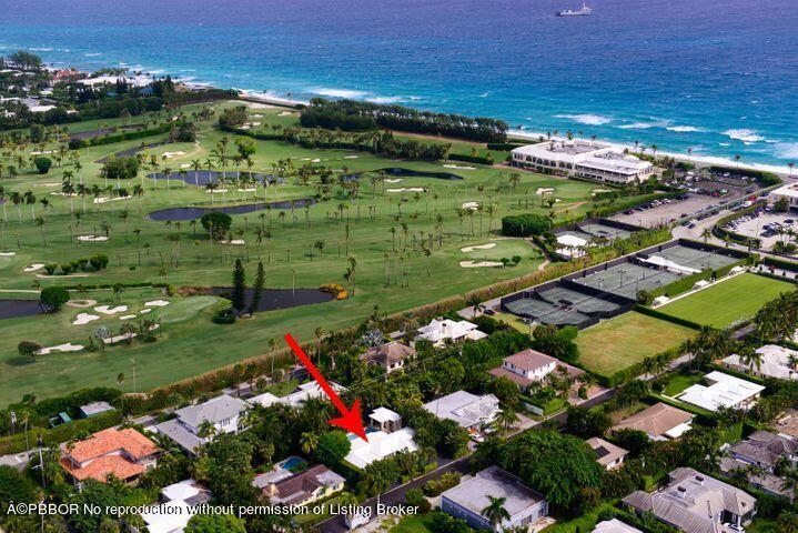 257 Fairview Road Palm Beach, FL 33480 - Photo 4 of 20 a view of a garden with flowers