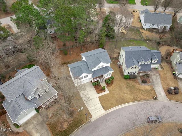 an aerial view of residential house with outdoor space