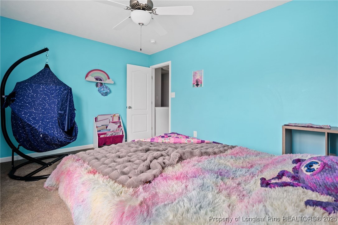 332 Dundee Circle Raeford, NC 28376 - Photo 20 of 35 a bedroom with a bed dresser and a window