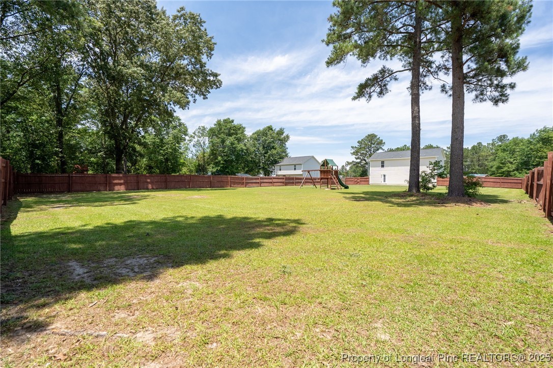 332 Dundee Circle Raeford, NC 28376 - Photo 34 of 35 a view of a swimming pool and an outdoor space