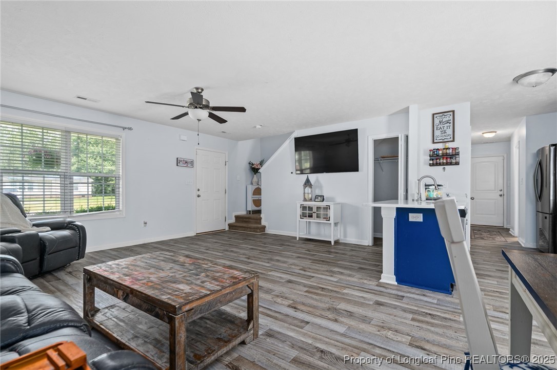 332 Dundee Circle Raeford, NC 28376 - Photo 7 of 35 a living room with furniture and a flat screen tv