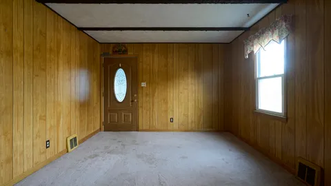 a view of a room with windows