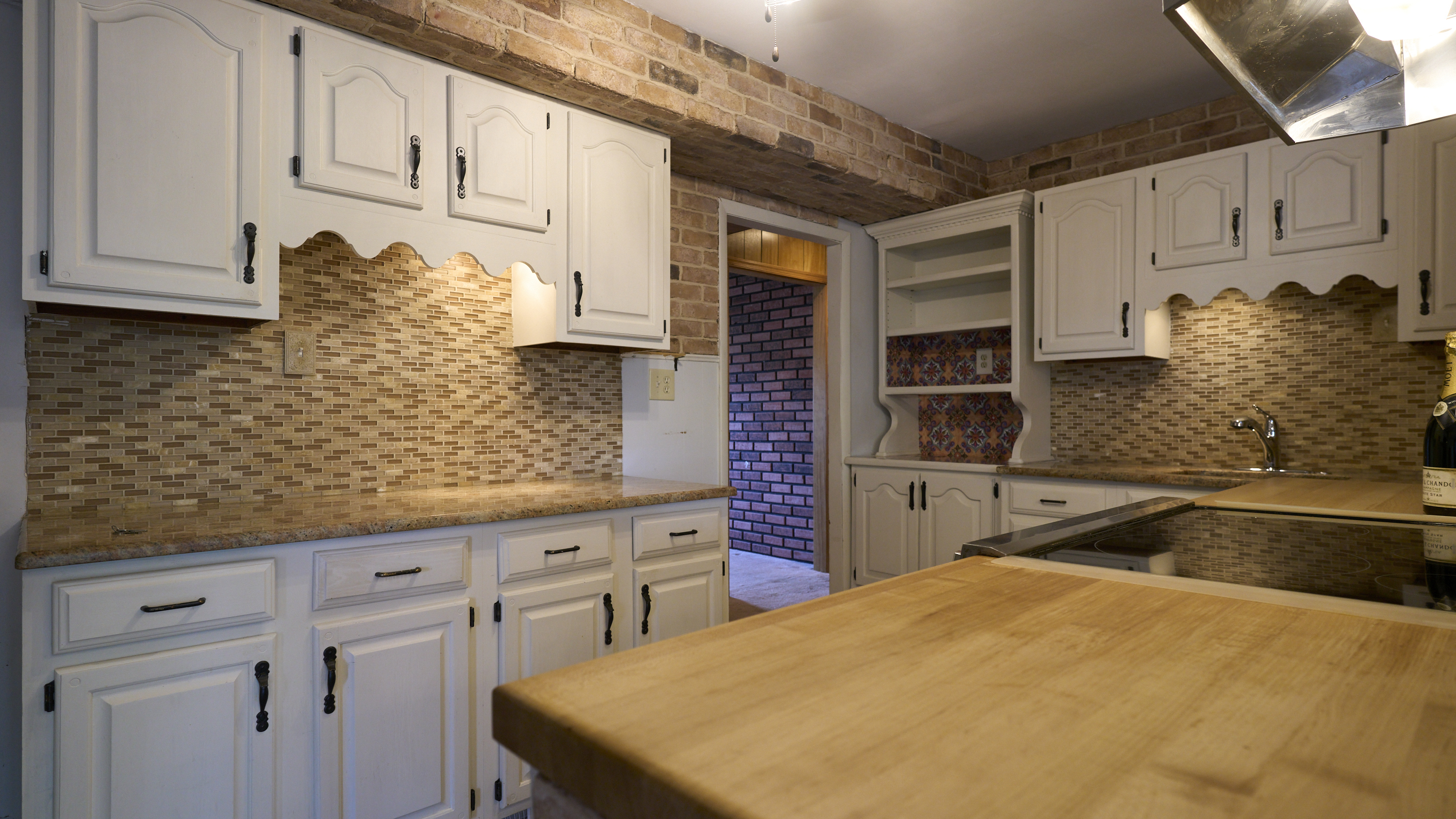 123 Beverly Drive Bridgeport, CT 06610 - Photo 15 of 34 a kitchen with stainless steel appliances granite countertop a sink and cabinets