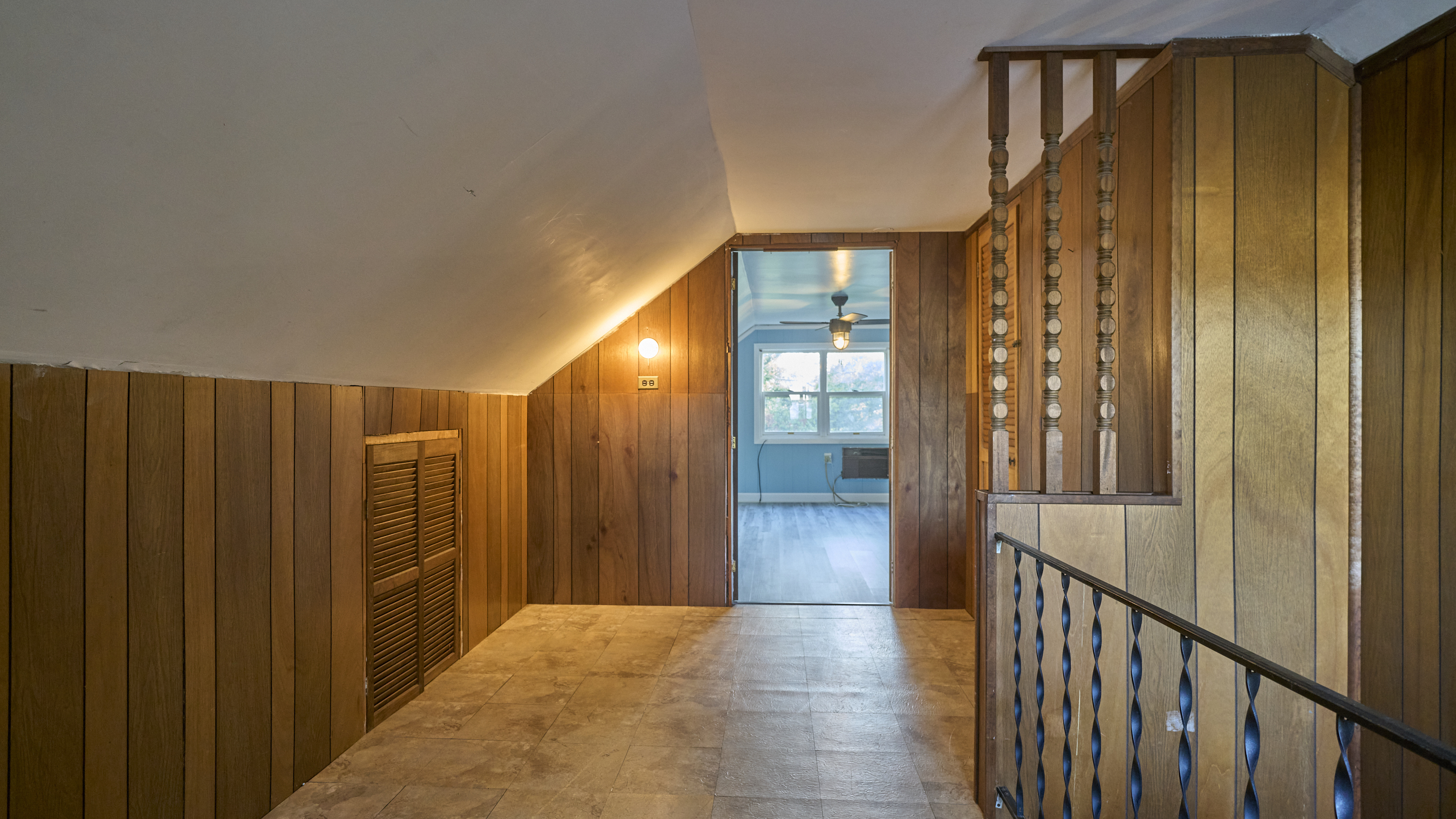 123 Beverly Drive Bridgeport, CT 06610 - Photo 24 of 34 a view of a hallway with wooden walls