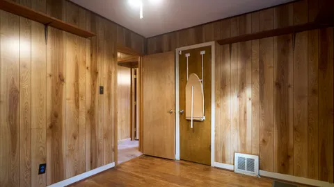 a view of a bathroom from a hallway
