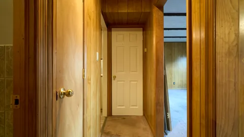 a bathroom with a shower and a toilet
