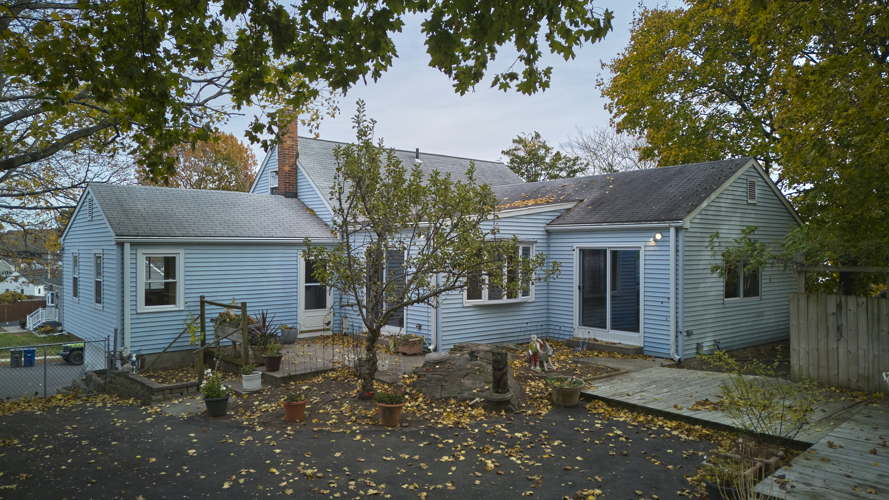 123 Beverly Drive Bridgeport, CT 06610 - Photo 6 of 34 a front view of a house with garden
