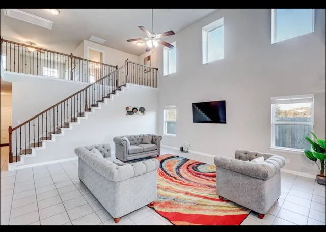 a living room with furniture and a couch