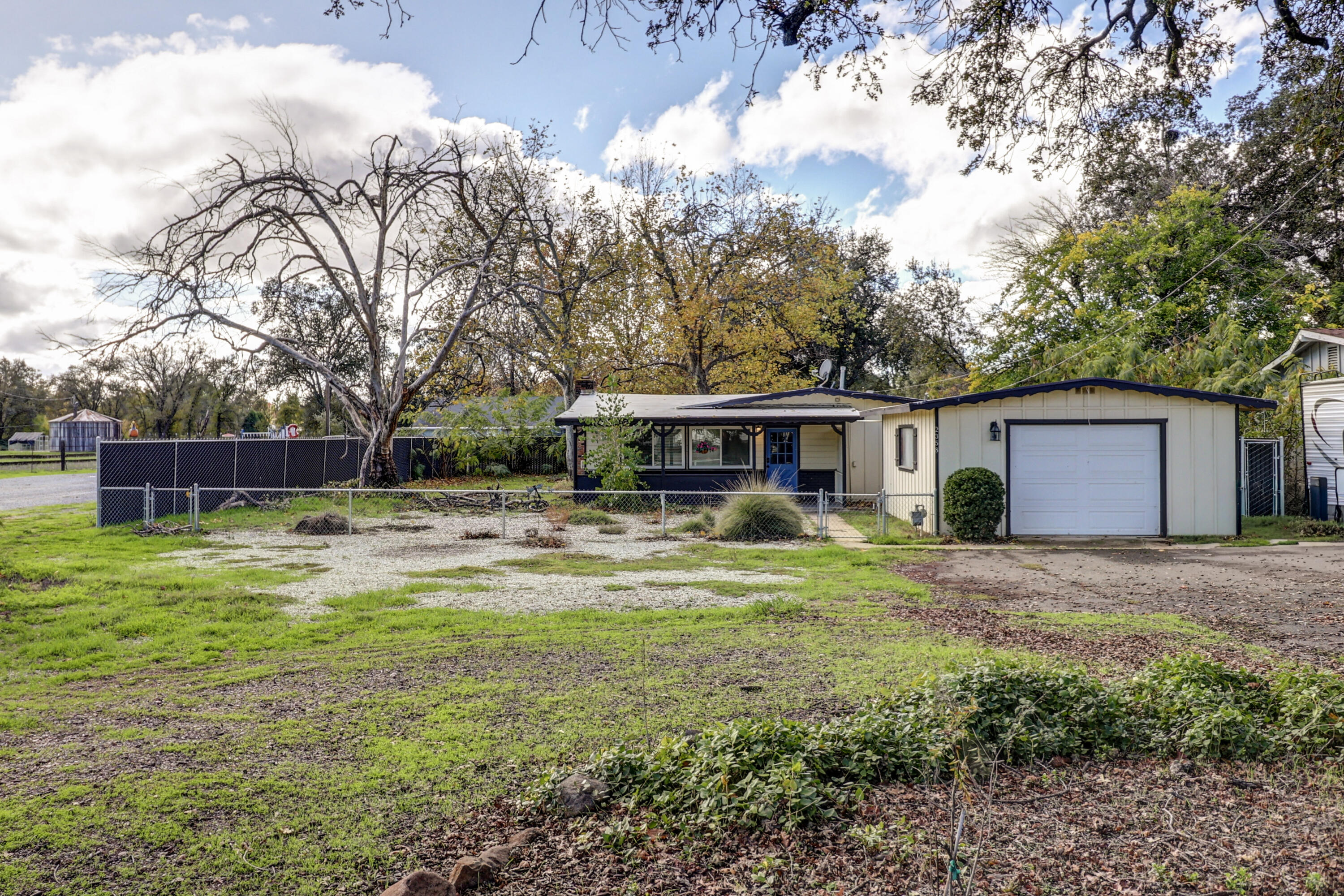 2358 Balls Ferry Road Anderson, CA 96007 - Photo 23 of 24 a front view of house with yard and trees