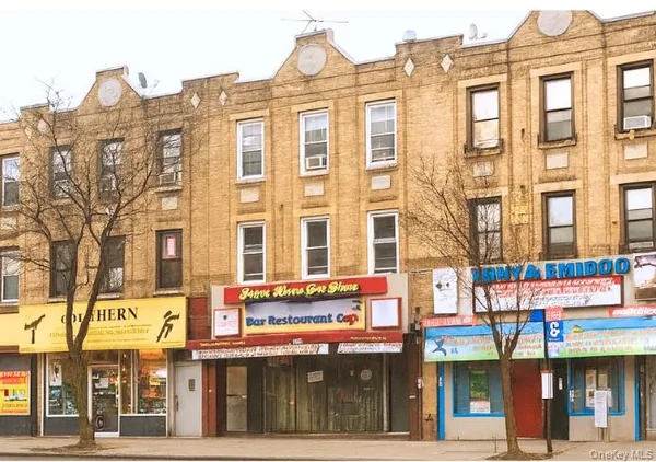a view of a food market with retail shops