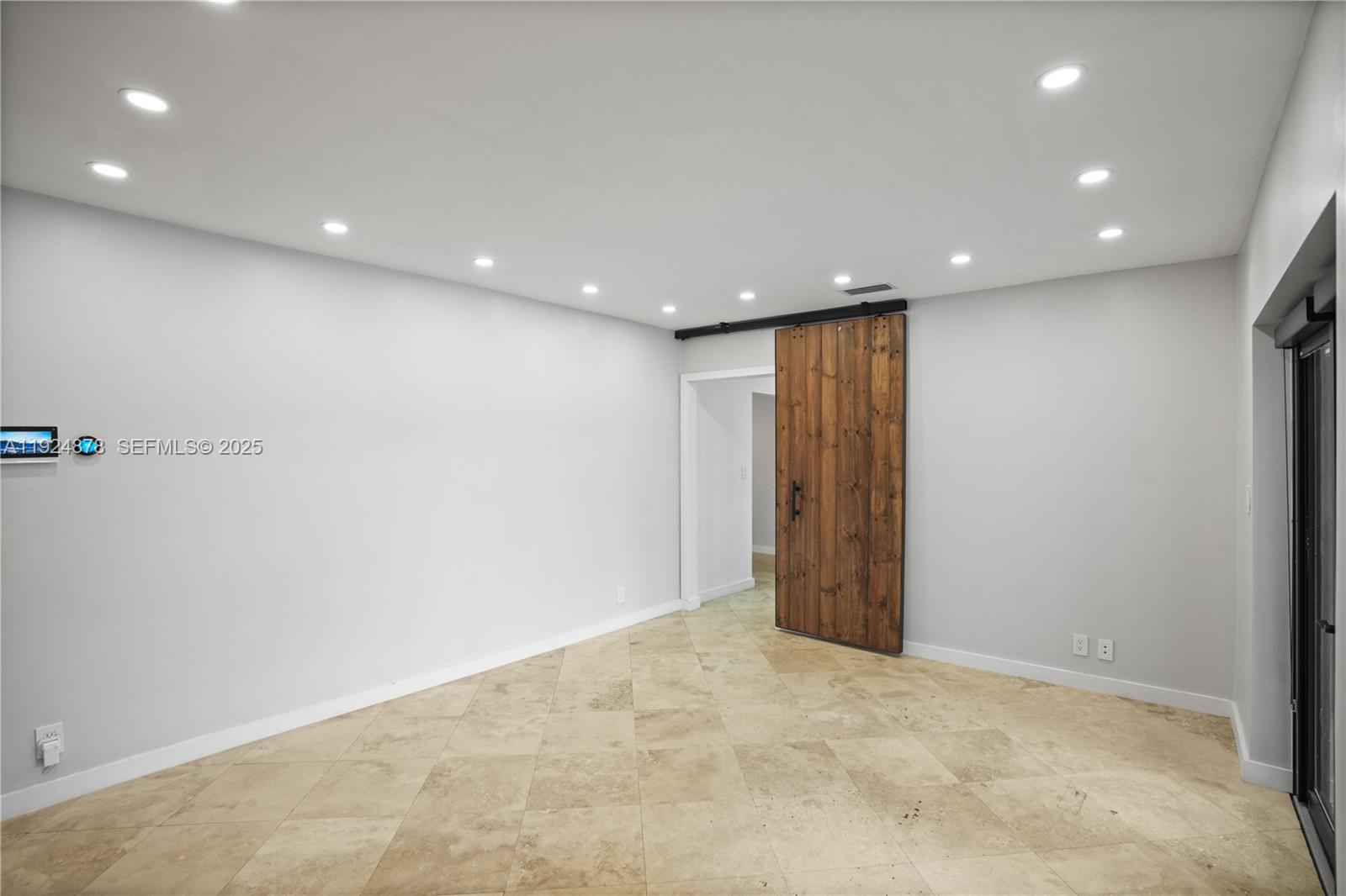 19911 Southwest 82nd Place Cutler Bay, FL 33189 - Photo 14 of 43 a view of an empty room