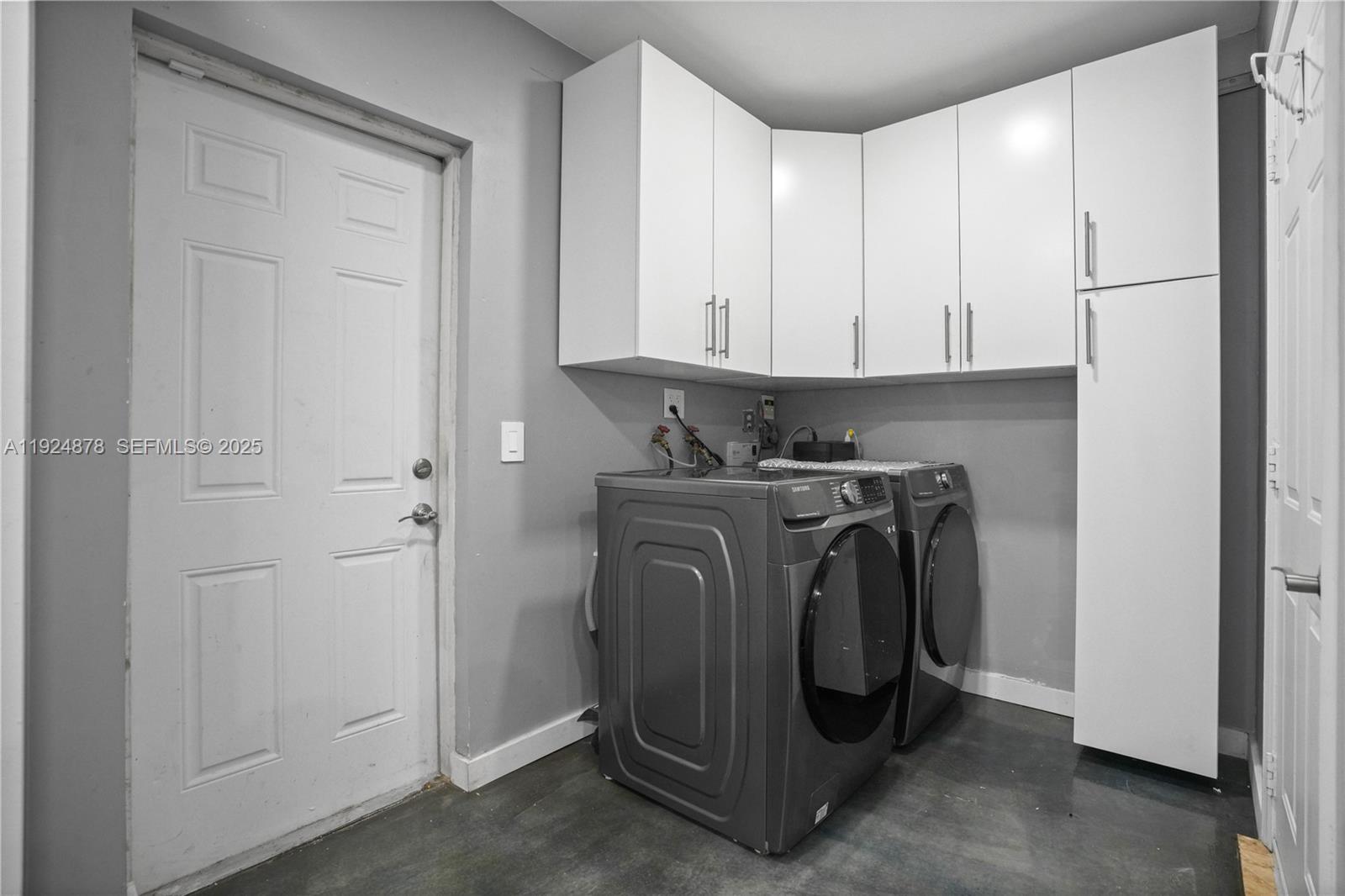 19911 Southwest 82nd Place Cutler Bay, FL 33189 - Photo 28 of 43 a utility room with dryer and washer