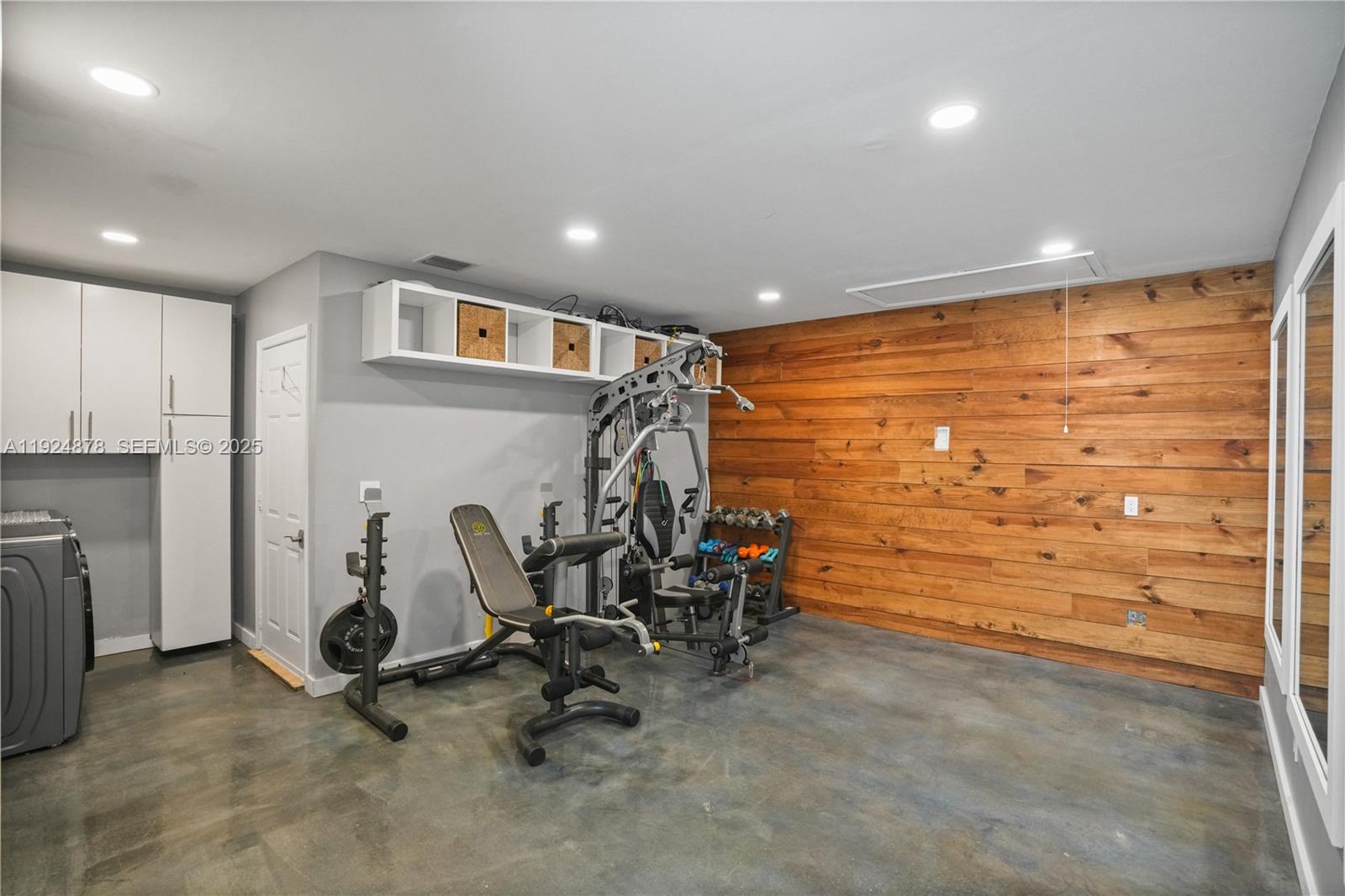 19911 Southwest 82nd Place Cutler Bay, FL 33189 - Photo 30 of 43 a view of a room with gym equipment
