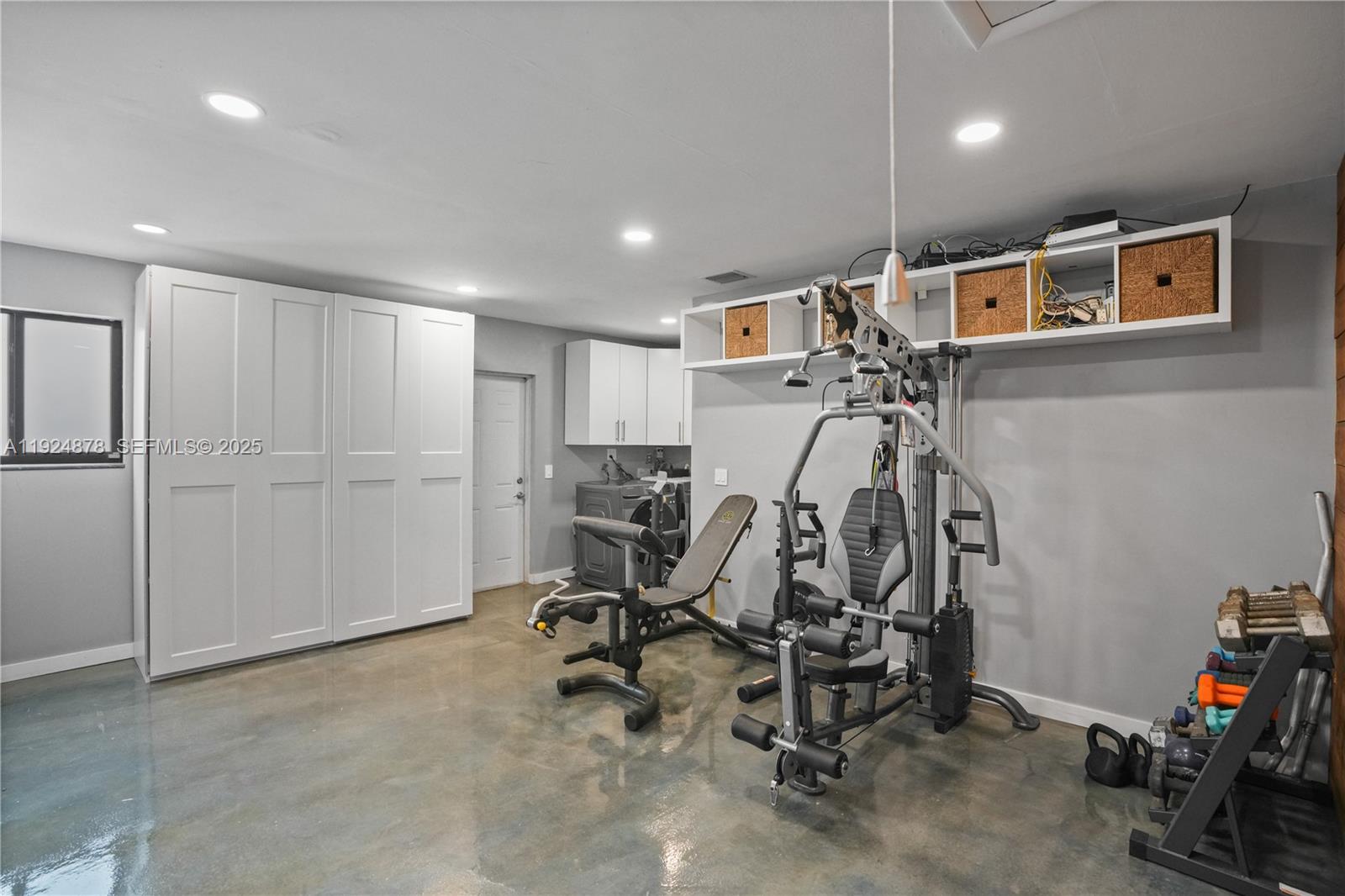 19911 Southwest 82nd Place Cutler Bay, FL 33189 - Photo 31 of 43 a view of a room with gym equipment