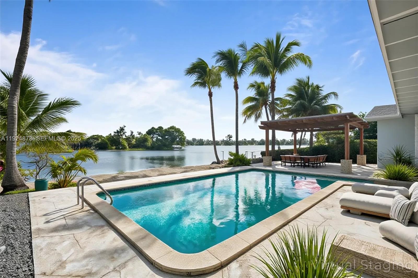 19911 Southwest 82nd Place Cutler Bay, FL 33189 - Photo 37 of 43 a view of swimming pool with a lounge chair