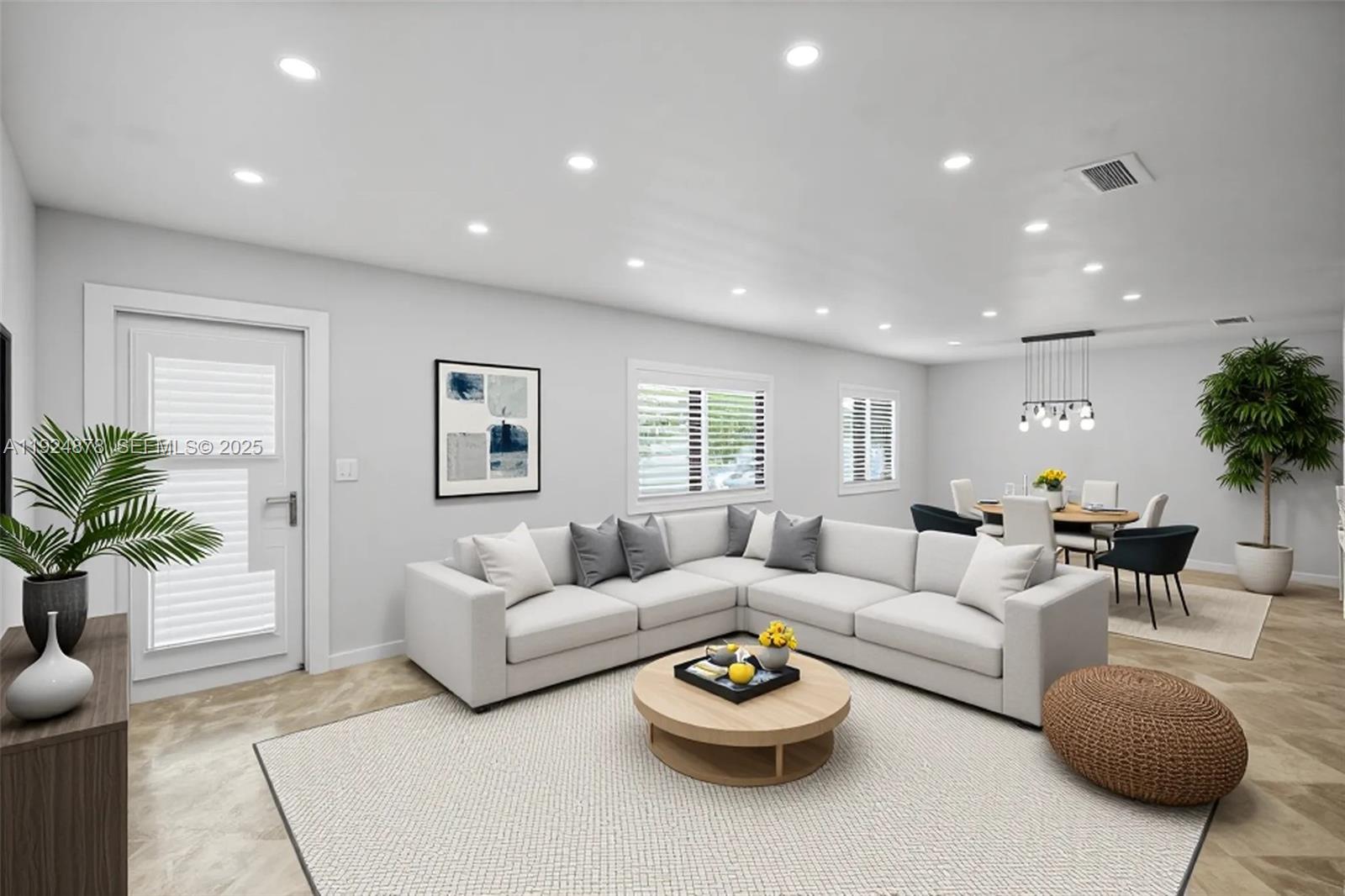 19911 Southwest 82nd Place Cutler Bay, FL 33189 - Photo 4 of 43 a living room with furniture and a wooden floor