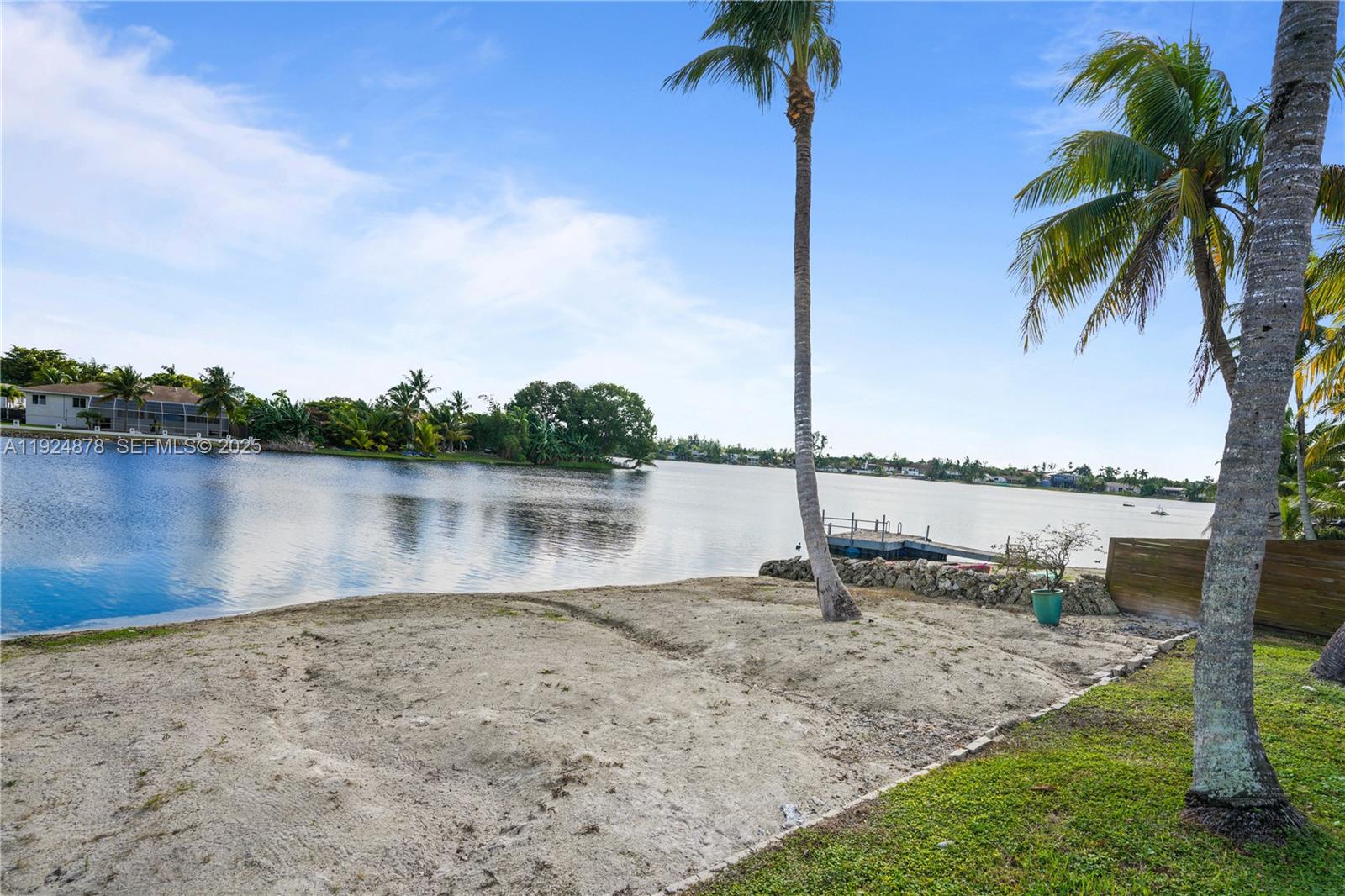 19911 Southwest 82nd Place Cutler Bay, FL 33189 - Photo 42 of 43 a lake view with a palm tree