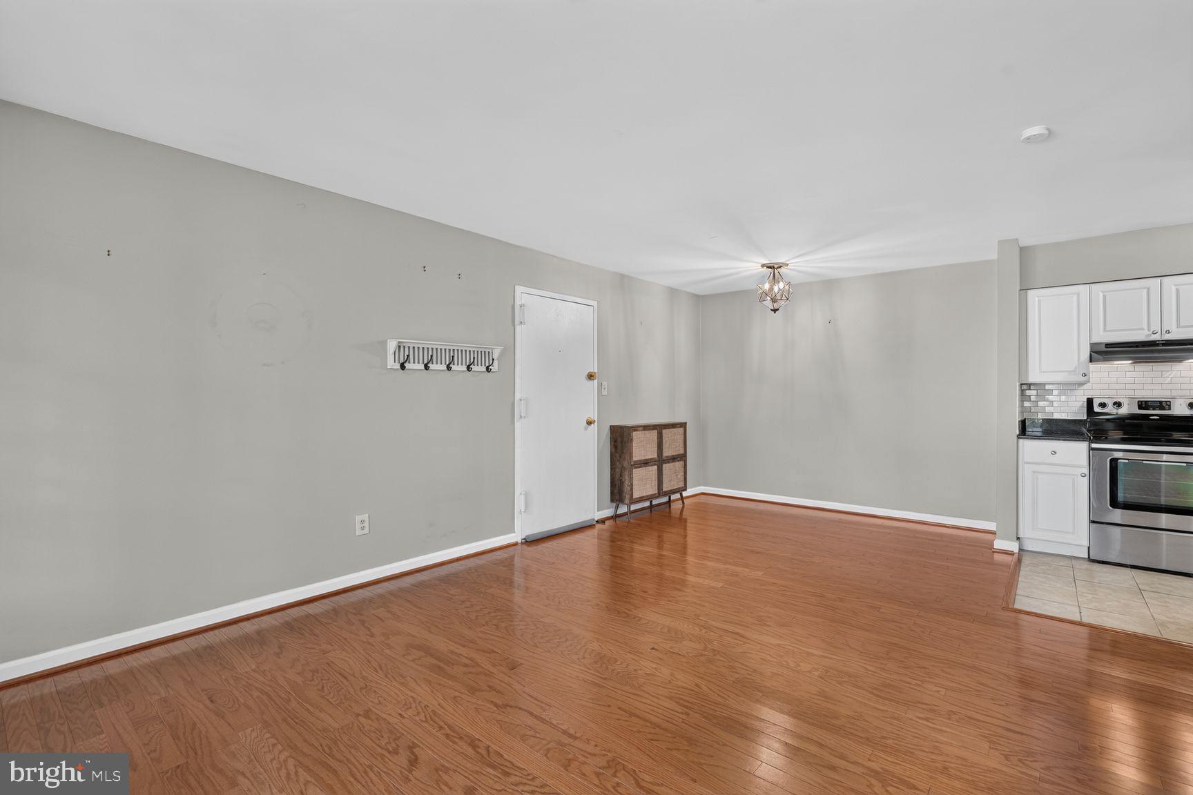 8358 K Dunham Court, Unit 627 Springfield, VA 22152 - Photo 3 of 15 Entry, dining & living areas