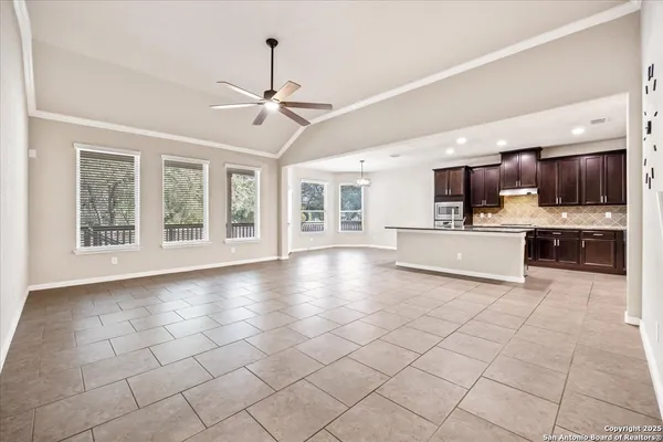 a view of living room with furniture and flat screen tv