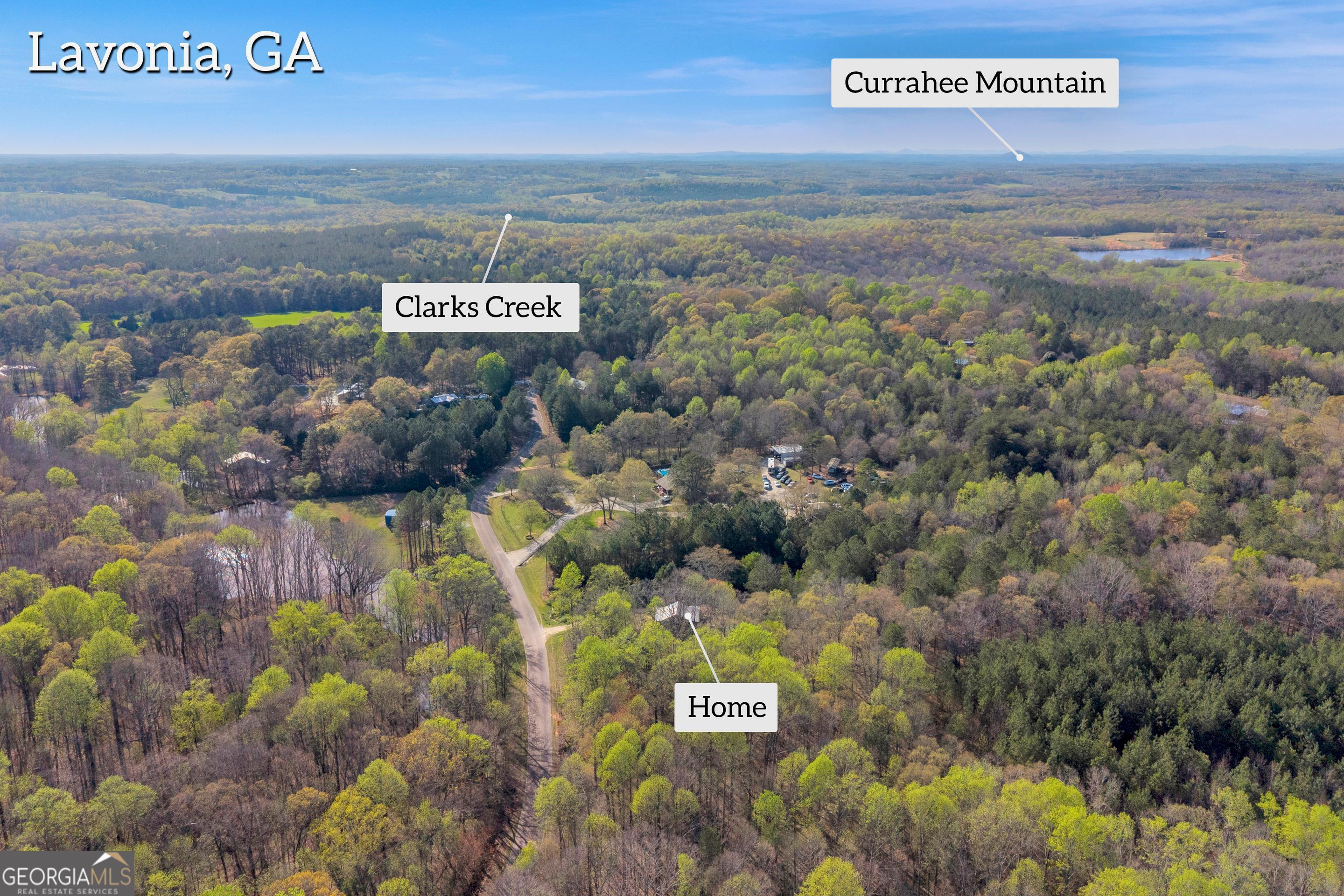 1413 Whiting Road Lavonia, GA 30553 - Photo 1 of 1 Private 4.40-acre setting surrounded by natural landscape with nearby landmarks and peaceful surroundings.