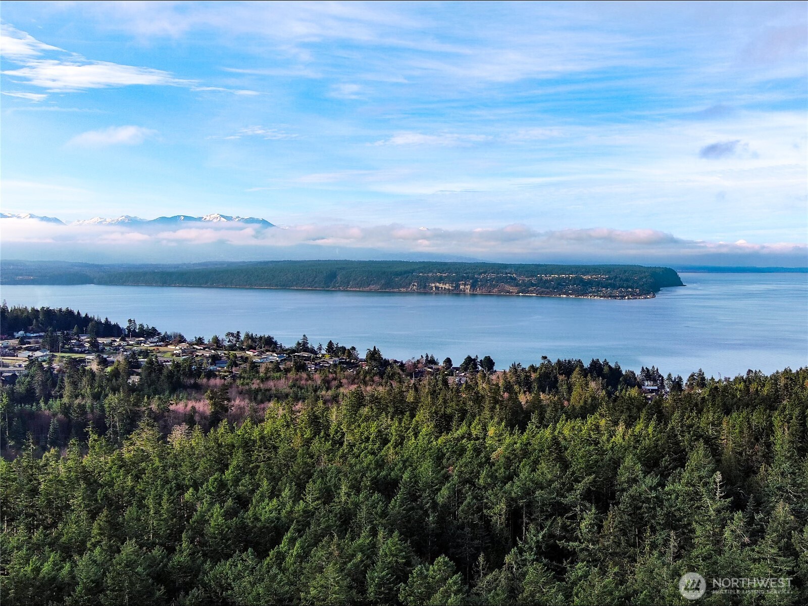 9999 Protection Ridge Road Port Townsend, WA 98368 - Photo 39 of 39 a view of a lake with houses in the back