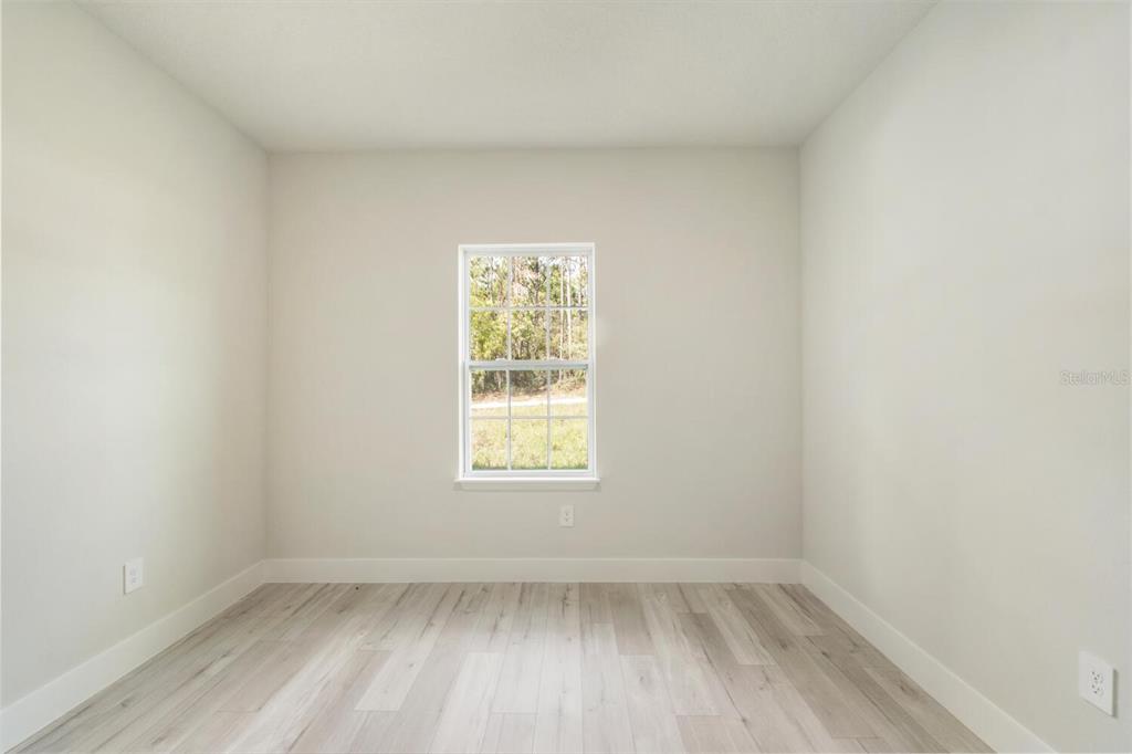 9371 North Cougar Paw Drive Dunnellon, FL 34433 - Photo 27 of 34 an empty room with a window