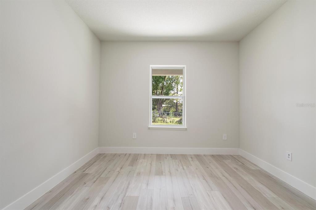 9371 North Cougar Paw Drive Dunnellon, FL 34433 - Photo 30 of 34 an empty room with a window