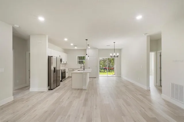 a view of a kitchen and a sink