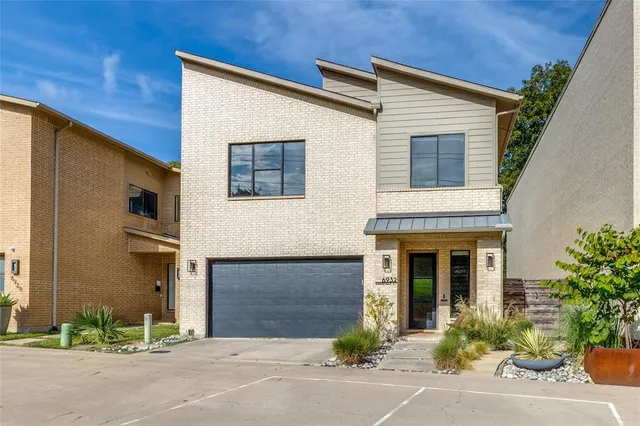 a brick house with a large windows