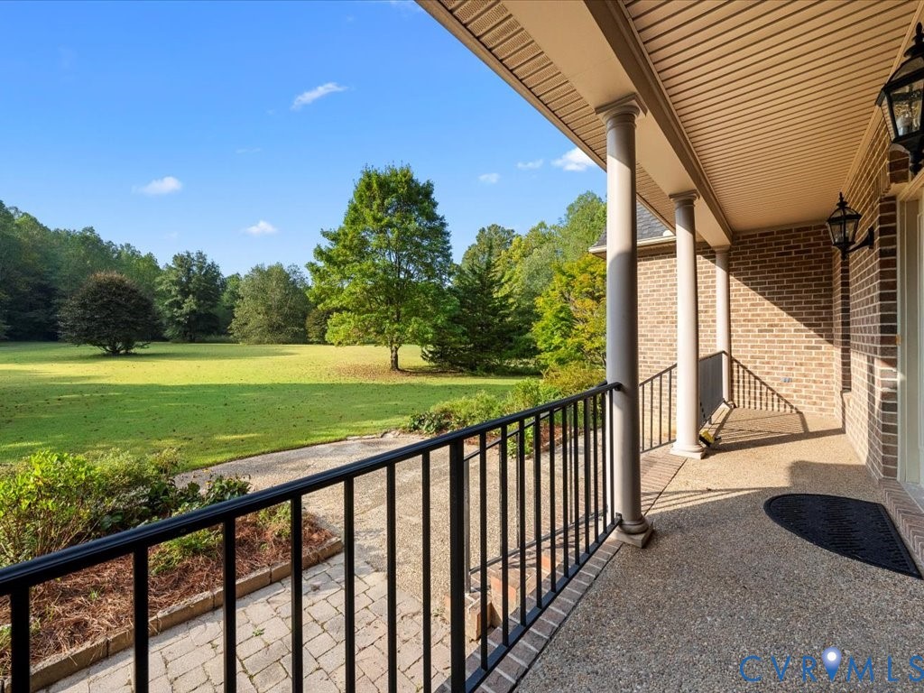 5515 Herring Creek Road Aylett, VA 23009 - Photo 11 of 50 a view of a two chairs in the balcony