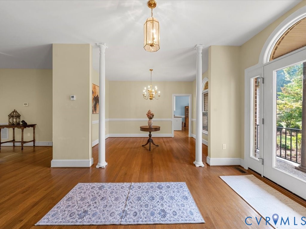 5515 Herring Creek Road Aylett, VA 23009 - Photo 15 of 50 a view of a hallway view with wooden floor and windows