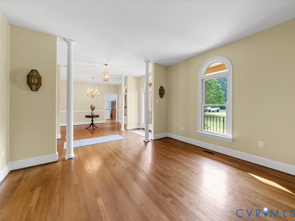 5515 Herring Creek Road Aylett, VA 23009 - Photo 16 of 50 a view of a room with wooden floor and a window