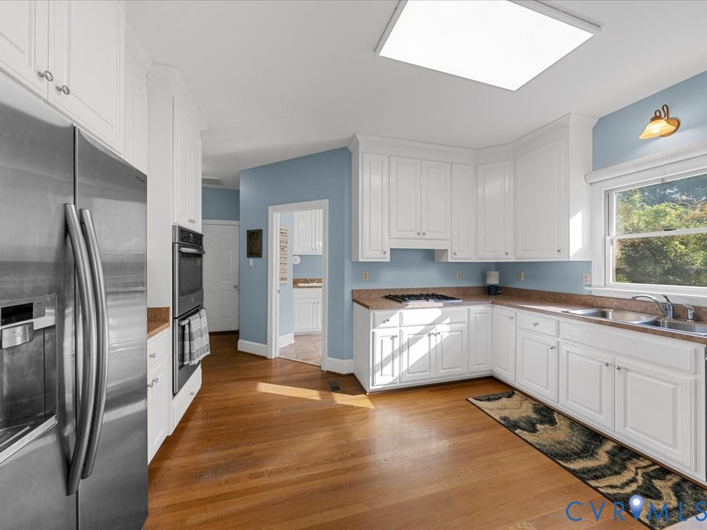 5515 Herring Creek Road Aylett, VA 23009 - Photo 23 of 50 a kitchen with stainless steel appliances granite countertop a refrigerator and a sink