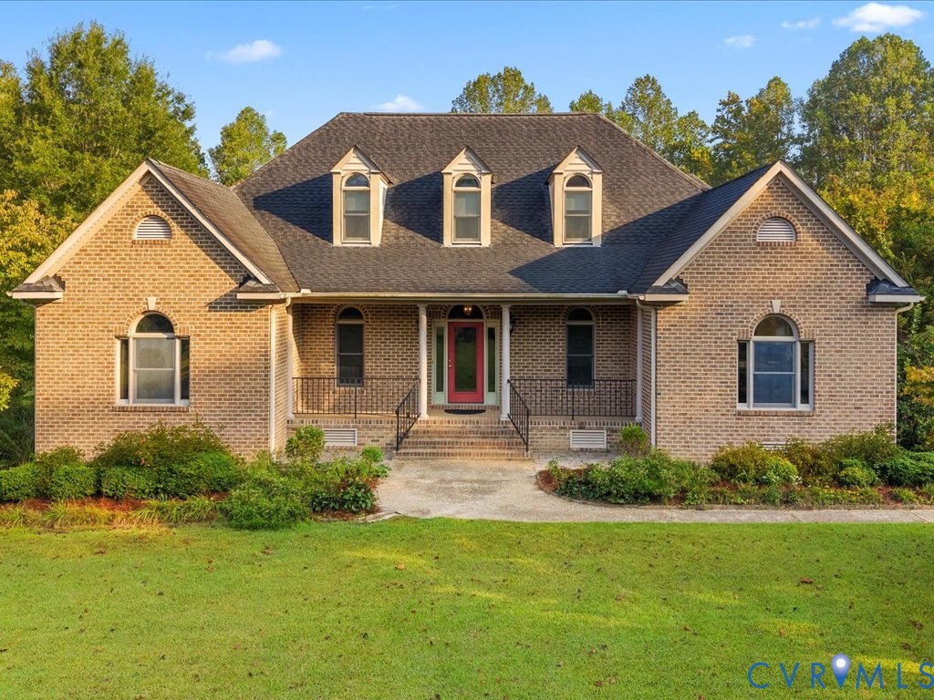 5515 Herring Creek Road Aylett, VA 23009 - Photo 3 of 50 a front view of a house with a yard