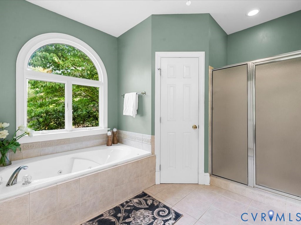 5515 Herring Creek Road Aylett, VA 23009 - Photo 34 of 50 a bathroom with a tub sink and window