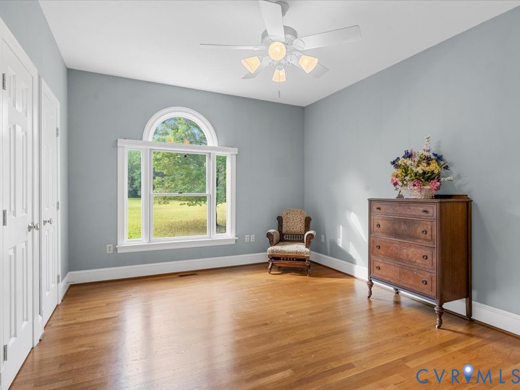 5515 Herring Creek Road Aylett, VA 23009 - Photo 36 of 50 a living room with furniture and a window