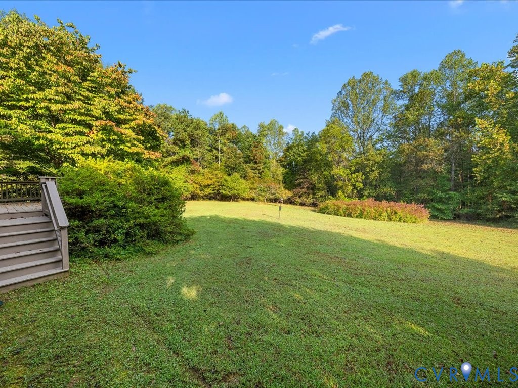 5515 Herring Creek Road Aylett, VA 23009 - Photo 46 of 50 a view of yard with swimming pool and green space