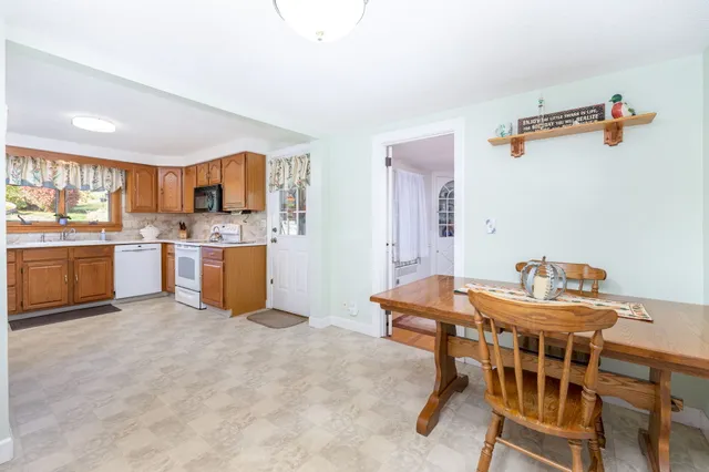 a view of a workspace with furniture