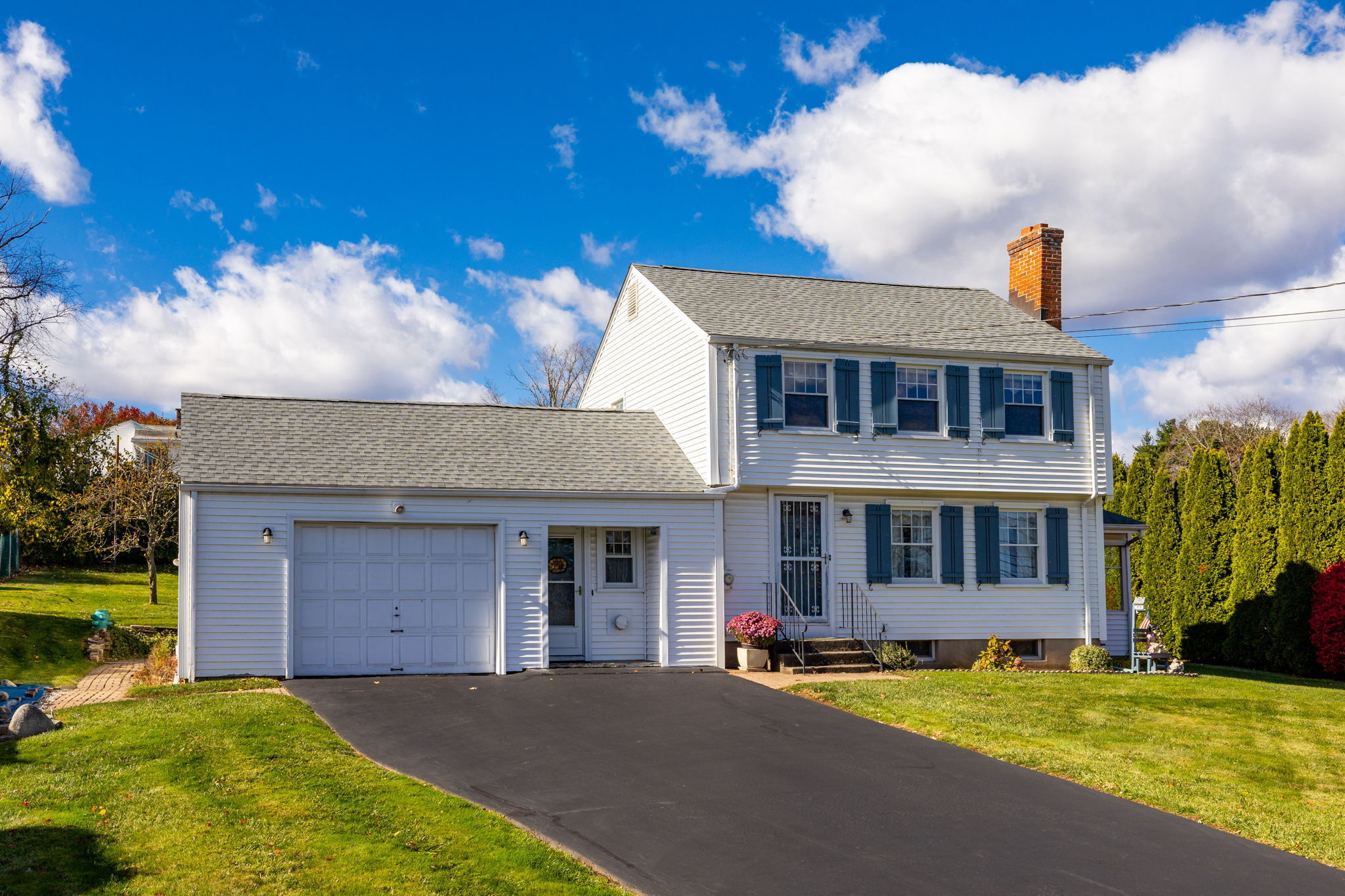 231 Charter Road Rocky Hill, CT 06067 - Photo 33 of 37 a front view of a house with a yard