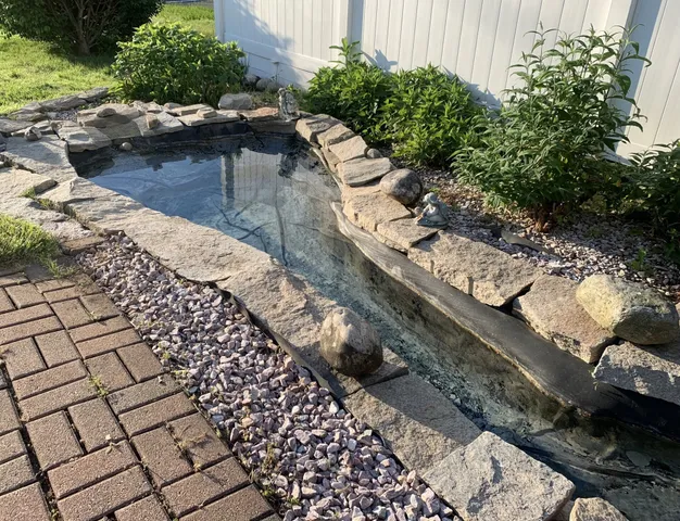 a view of a backyard of the house