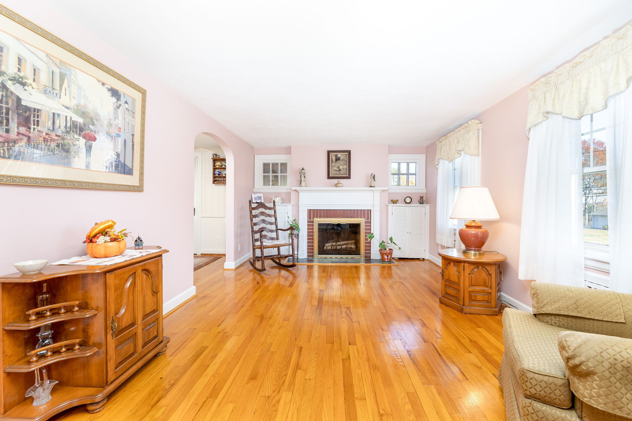 231 Charter Road Rocky Hill, CT 06067 - Photo 8 of 37 a living room with furniture and a fireplace