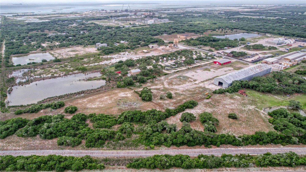 1490 Sunray Road Ingleside, TX 78362 - Photo 13 of 15 an aerial view of residential houses with outdoor space and trees