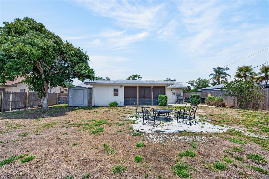 532 Center Road Venice, FL 34285 - Photo 54 of 68 a view of a house with backyard and sitting area
