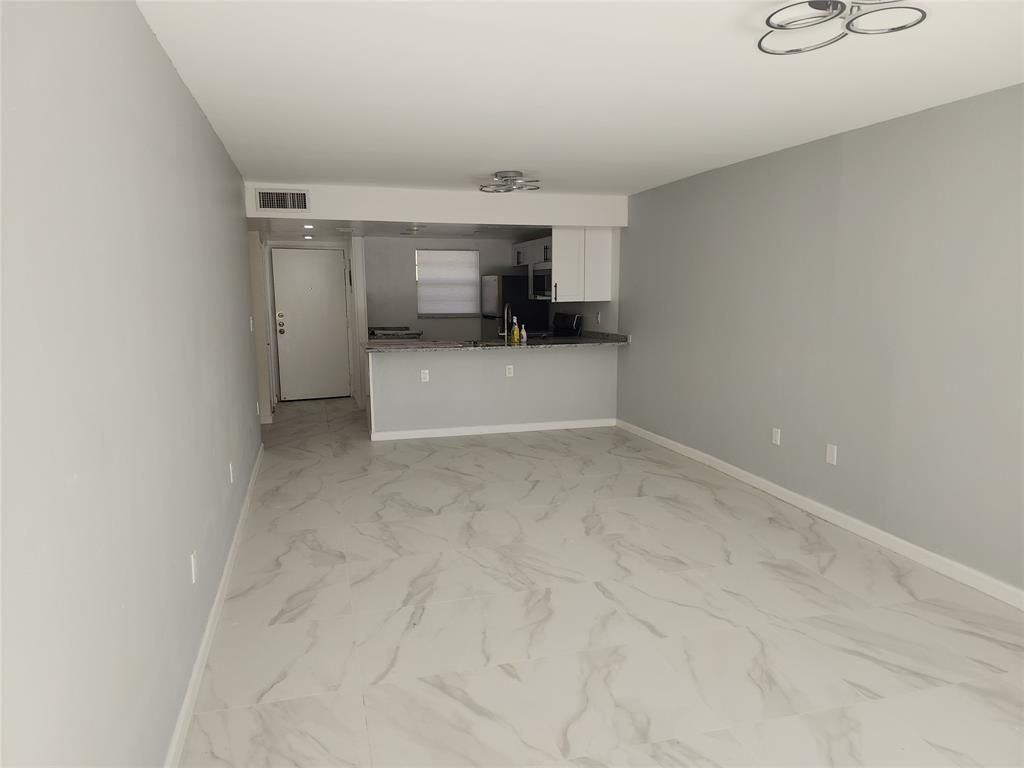 485 North Pine Island Road, Unit 204 Fort Lauderdale, FL 33324 - Photo 6 of 14 a view of a storage & utility room